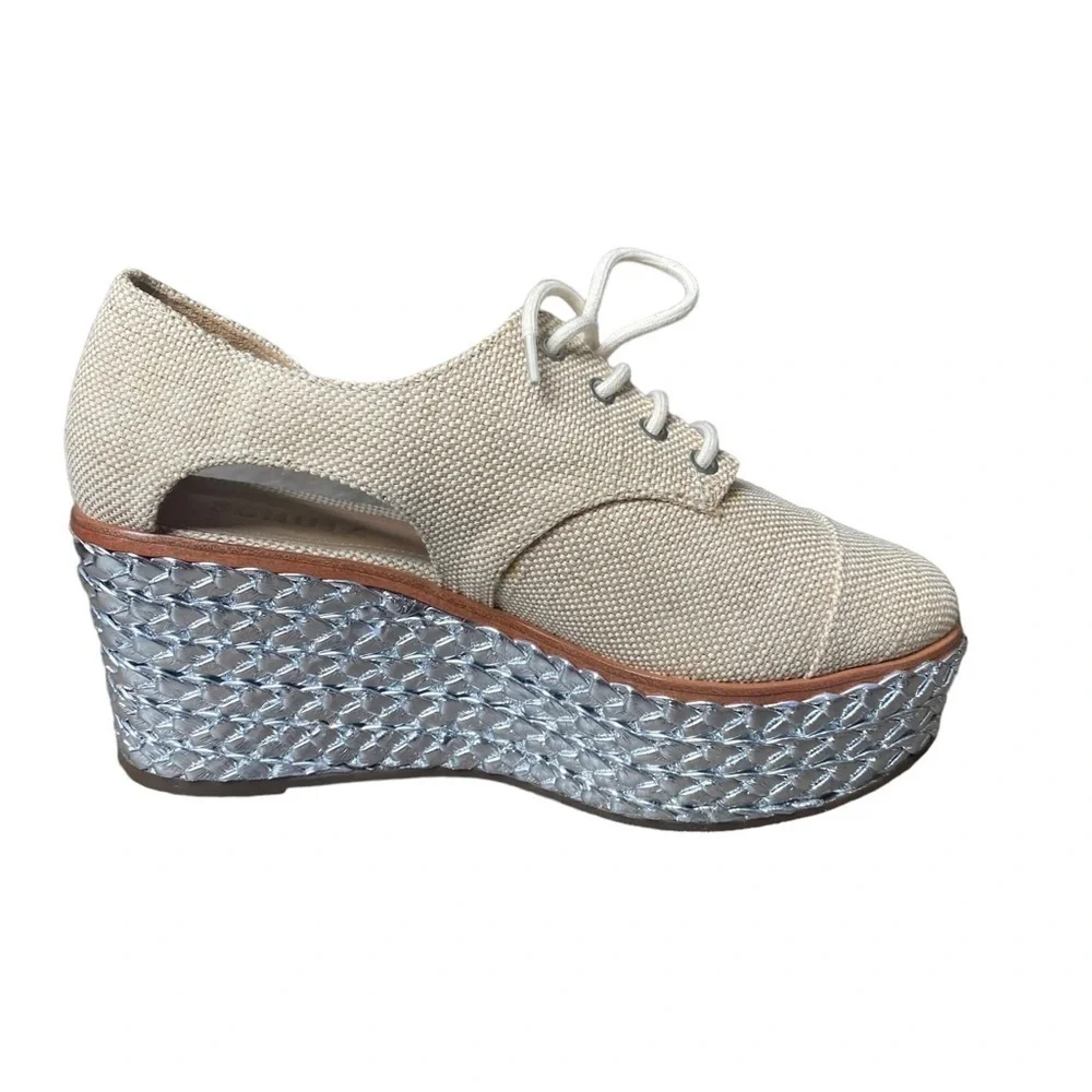 SCHUTZ Cream Lace-Up Platform Wedges with Silver Braided Sole